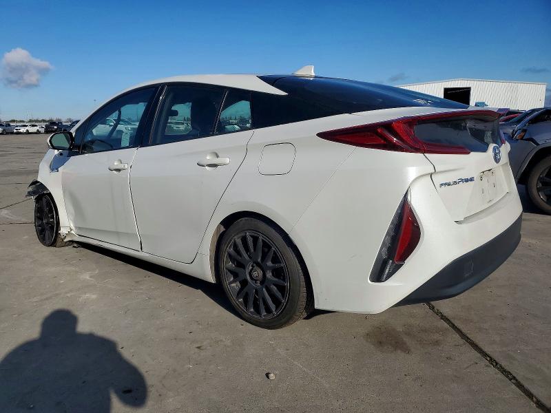 Photo 2 from auction – 2018 TOYOTA PRIUS PRIM with VIN JTDKARFP9J3098136