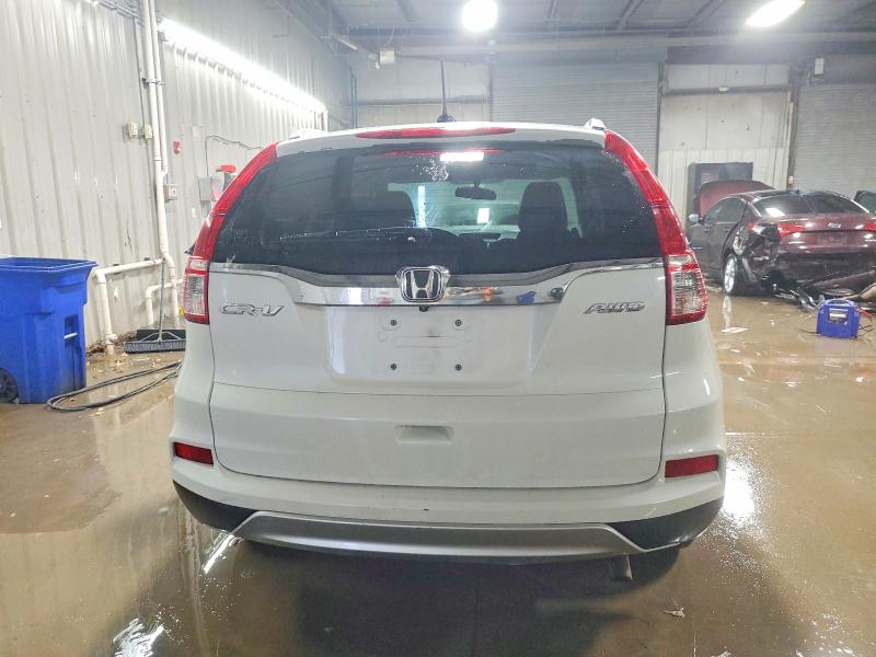 Foto 6 de la subasta – 2016 HONDA CR-V con VIN 5J6RM4H72GL072969
