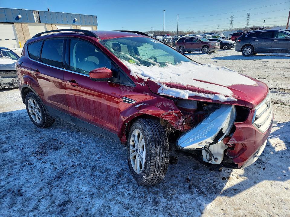 Photo 4 from auction – 2018 FORD ESCAPE SE with VIN 1FMCU0GD1JUA21052