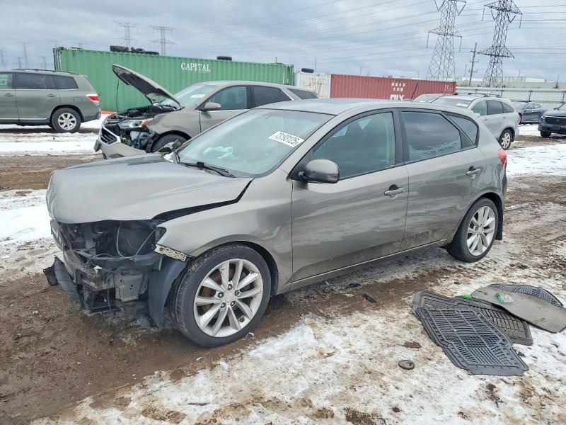 KIA FORTE 2011 with VIN KNAFW5A34B5423665 - Photo from auction