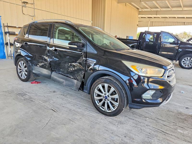 Photo 4 from auction – 2017 FORD ESCAPE TIT with VIN 1FMCU9J9XHUB13408