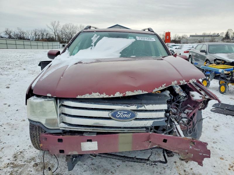 Photo 5 from auction – 2008 FORD TAURUS X E with VIN 1FMDK07W38GA37239
