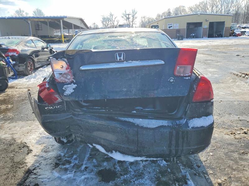 Photo 6 from auction – 2002 HONDA CIVIC LX with VIN 2HGES15542H519935
