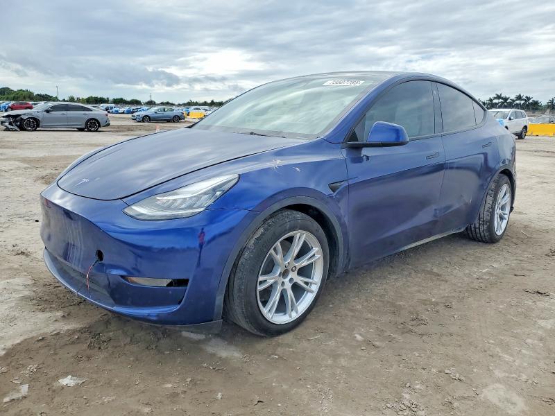 TESLA MODEL Y 2023 with VIN 7SAYGDEE6PA058975 - Photo from auction