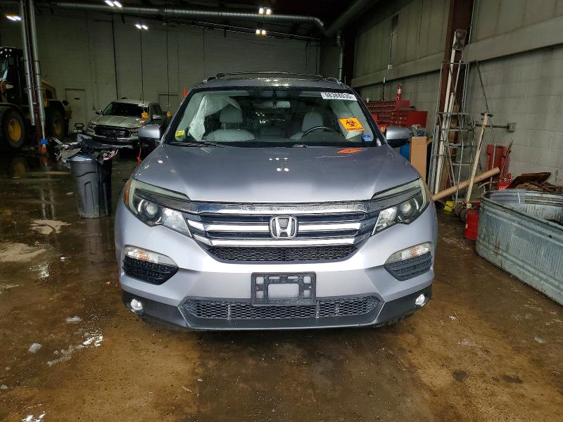 Photo 5 from auction – 2016 HONDA PILOT EXL with VIN 5FNYF6H54GB007145