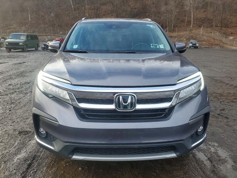 Photo 5 from auction – 2021 HONDA PILOT TOUR with VIN 5FNYF6H99MB070949