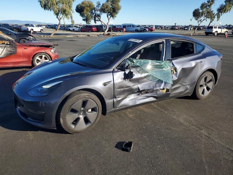TESLA MODEL 3 2023 with VIN 5YJ3E1EA1PF613990 - Photo from auction