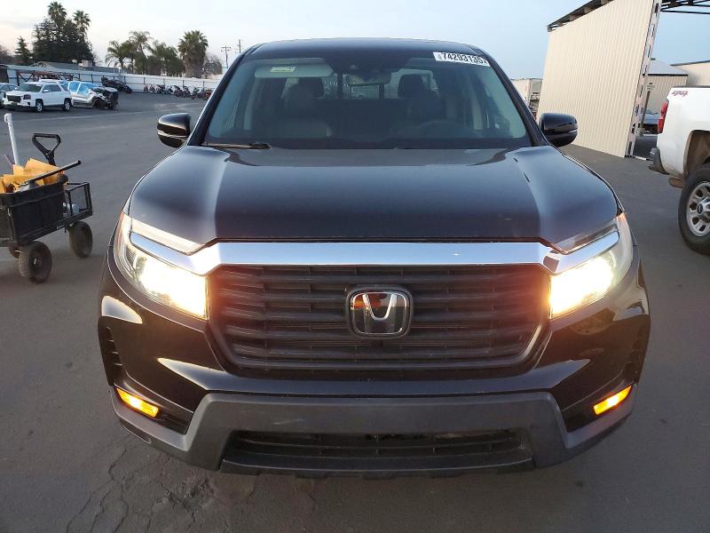 Photo 5 from auction – 2023 HONDA RIDGELINE with VIN 5FPYK3F54PB010213