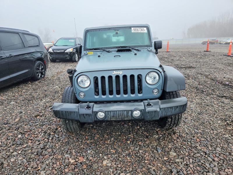 Photo 5 from auction – 2015 JEEP WRANGLER S with VIN 1C4AJWAG7FL584422