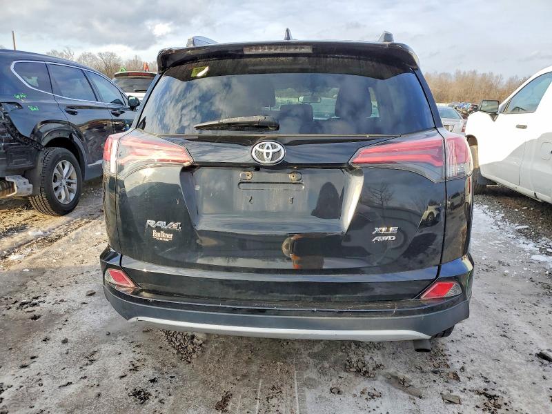 Photo 6 from auction – 2016 TOYOTA RAV4 XLE with VIN 2T3RFREV6GW535631