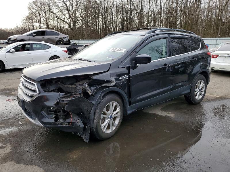 FORD ESCAPE SE 2017 with VIN 1FMCU9GD4HUC57841 - Photo from auction
