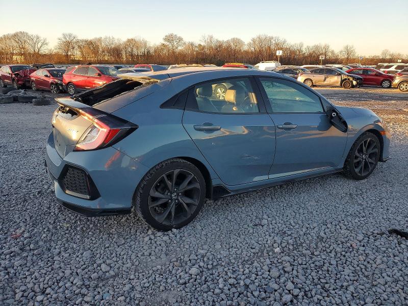 Photo 3 from auction – 2017 HONDA CIVIC SPOR with VIN SHHFK7G40HU205156