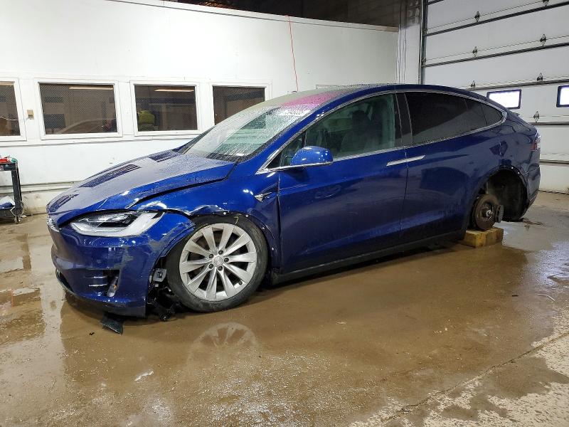 TESLA MODEL X 2020 with VIN 5YJXCBE2XLF298638 - Photo from auction