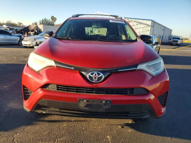 Photo 5 from auction – 2016 TOYOTA RAV4 LE with VIN JTMZFREV7GJ079122