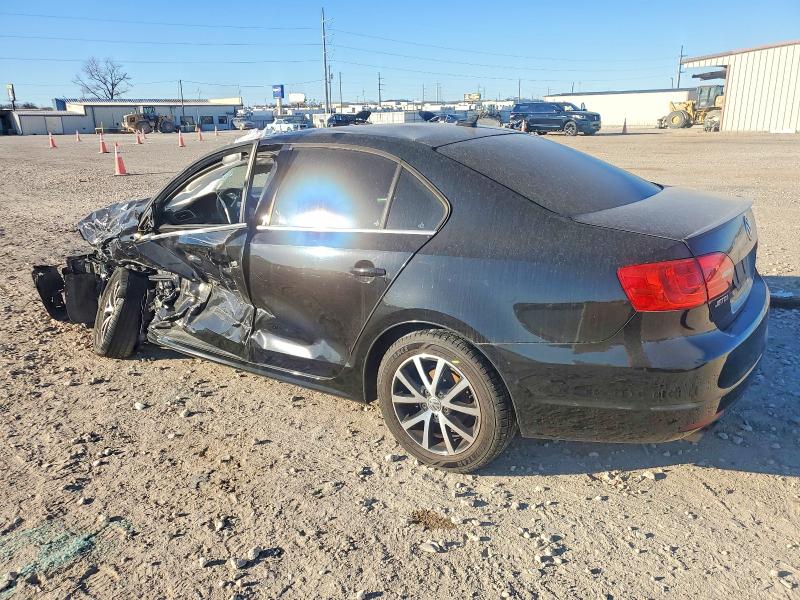 Photo 2 from auction – 2014 VOLKSWAGEN JETTA with VIN 3VWLL7AJ3EM380960