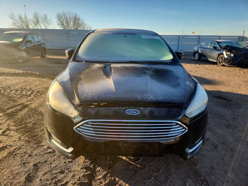 Photo 5 from auction – 2018 FORD FOCUS TITA with VIN 1FADP3J20JL288302