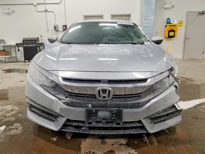 Photo 5 from auction – 2018 HONDA CIVIC with VIN 2HGFC2F55JH001871