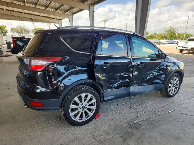 Photo 3 from auction – 2017 FORD ESCAPE TIT with VIN 1FMCU9J9XHUB13408