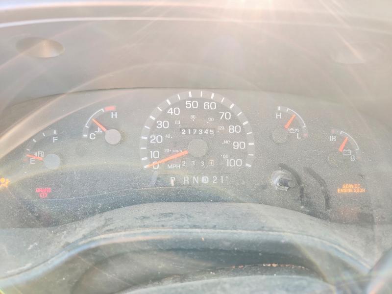 Photo 9 from auction – 2000 FORD ECONOLINE with VIN 1FMRE1129YHA77697