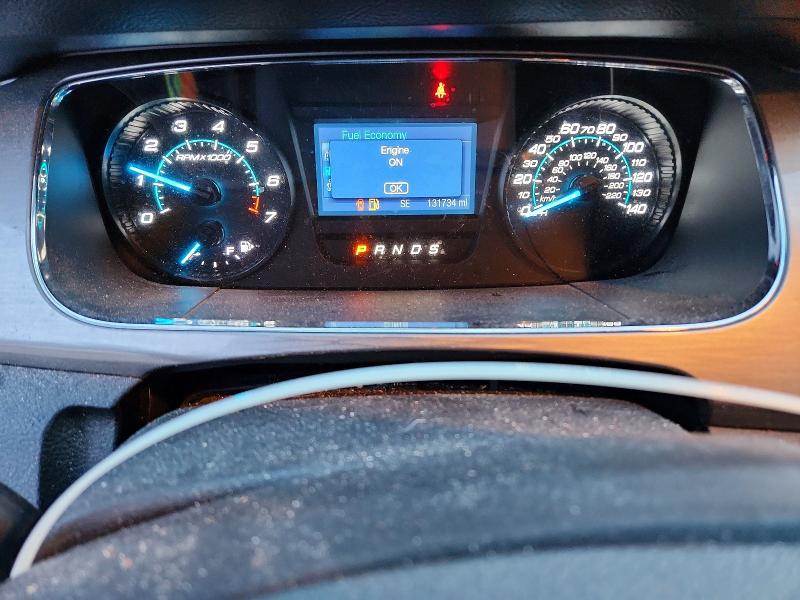 Photo 9 from auction – 2014 FORD TAURUS with VIN 1FAHP2E85EG102102