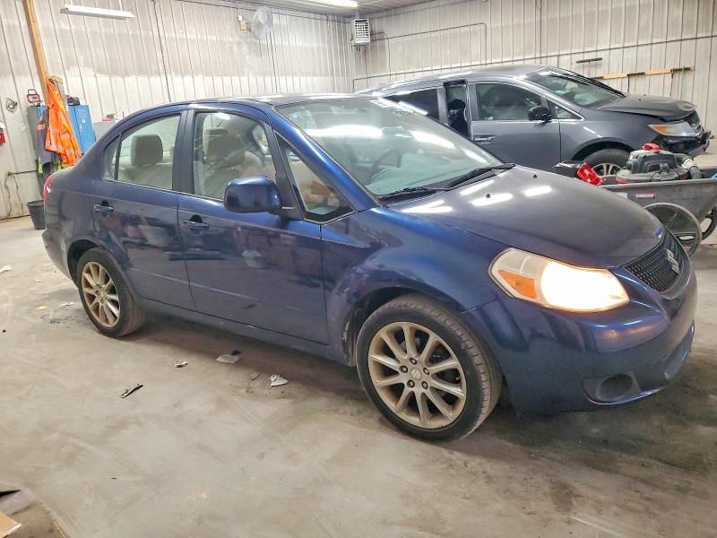 Photo 4 from auction – 2011 SUZUKI SX4 LE with VIN JS2YC5A22B6301737
