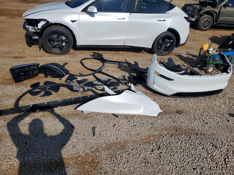 Photo 12 from auction – 2026 TESLA MODEL Y with VIN 7SAYGDED9TA501038