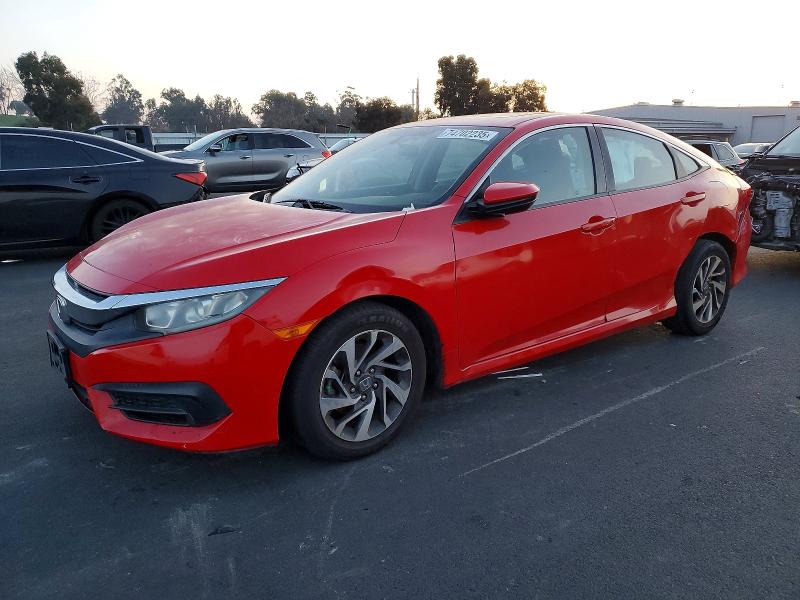 HONDA CIVIC 2018 with VIN 2HGFC2F72JH611082 - Photo from auction
