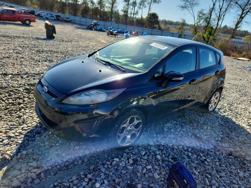 FORD FIESTA 2012 with VIN 3FADP4FJXCM104751 - Photo from auction