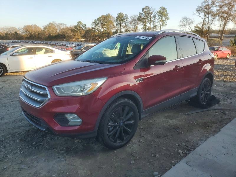 FORD ESCAPE TIT 2017 with VIN 1FMCU0J99HUE86399 - Photo from auction