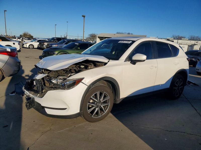 MAZDA CX-5 TOURI 2018 with VIN JM3KFACM6J1337559 - Photo from auction