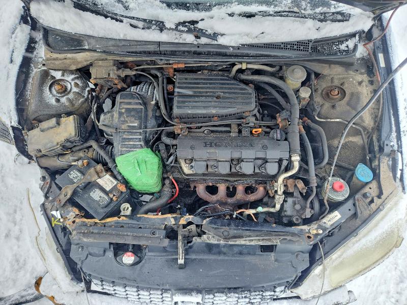 Photo 11 from auction – 2004 HONDA CIVIC LX with VIN 1HGEM21574L813504