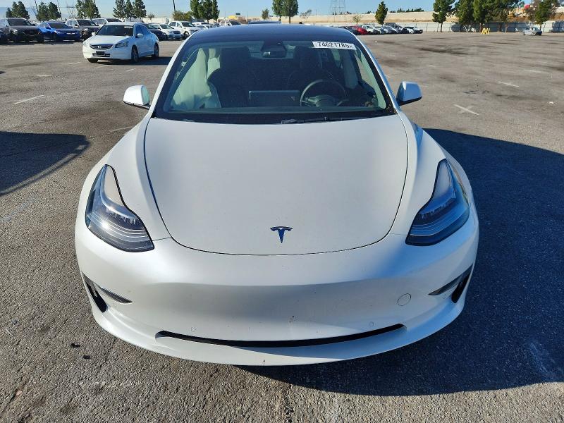 Photo 5 from auction – 2022 TESLA MODEL 3 with VIN 5YJ3E1EA8NF299235