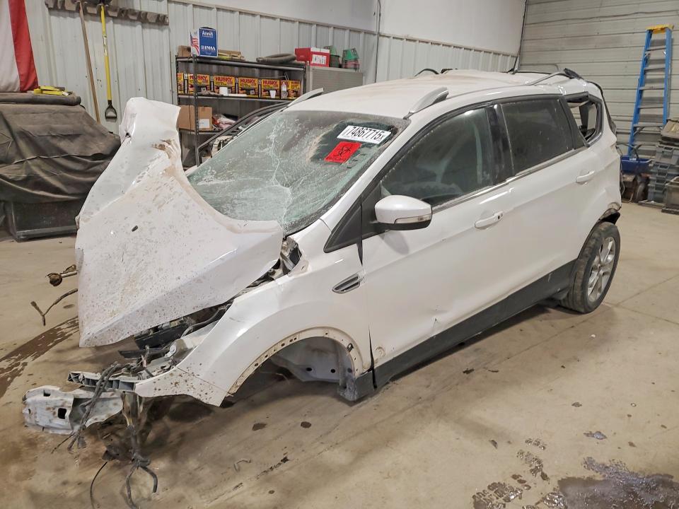 FORD ESCAPE 2015 with VIN 1FMCU9JXXFUB14926 - Photo from auction