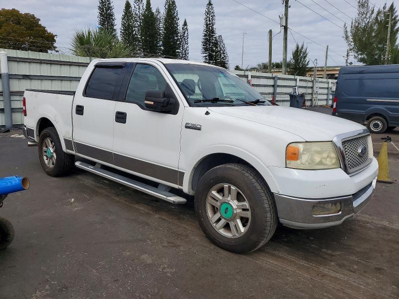 Photo 4 from auction – 2004 FORD F150 with VIN 1FTPW12554FA27970