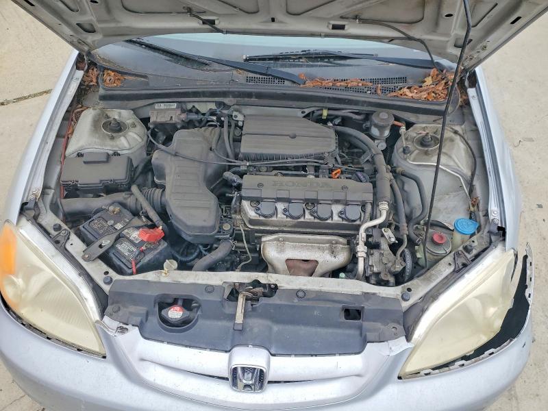 Photo 11 from auction – 2003 HONDA CIVIC LX with VIN 1HGEM22583L067643