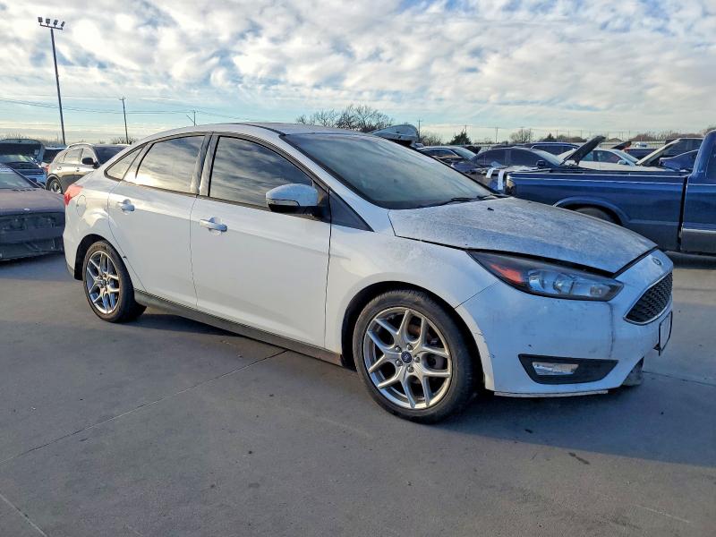 Photo 4 from auction – 2015 FORD FOCUS with VIN 1FADP3F24FL219046