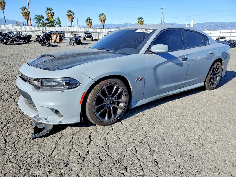 DODGE CHARGER 2021 with VIN 2C3CDXGJ2MH553764 - Photo from auction