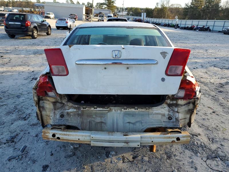 Photo 6 from auction – 2002 HONDA CIVIC LX with VIN 1HGES16512L009575
