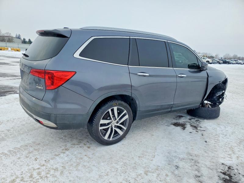 Photo 3 from auction – 2016 HONDA PILOT ELIT with VIN 5FNYF6H06GB110748