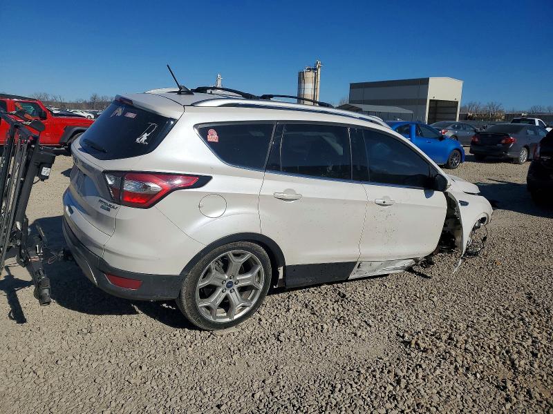 Photo 3 from auction – 2018 FORD ESCAPE with VIN 1FMCU9J94JUA86356