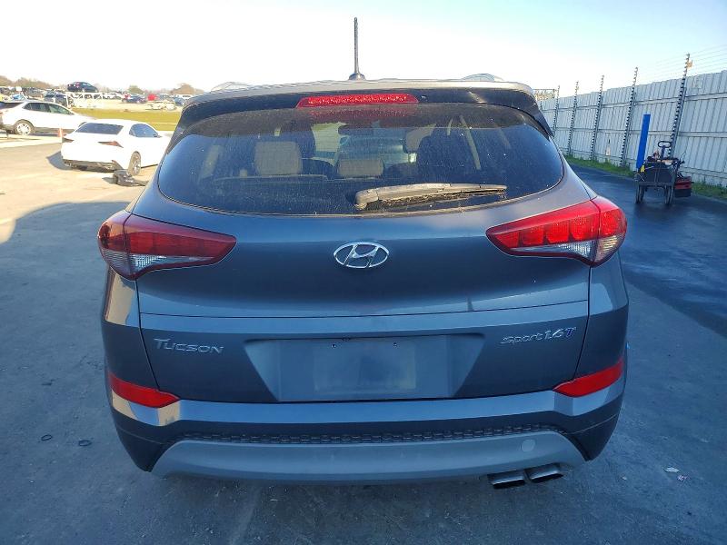 Photo 6 from auction – 2017 HYUNDAI TUCSON LIM with VIN KM8J33A24HU312402