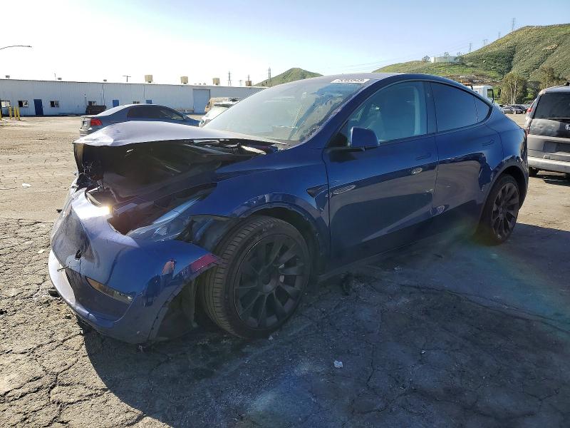 TESLA MODEL Y 2023 with VIN 7SAYGDEE8PF939227 - Photo from auction