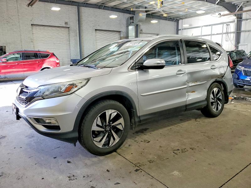 HONDA CR-V TOURI 2016 with VIN 5J6RM4H95GL105609 - Photo from auction