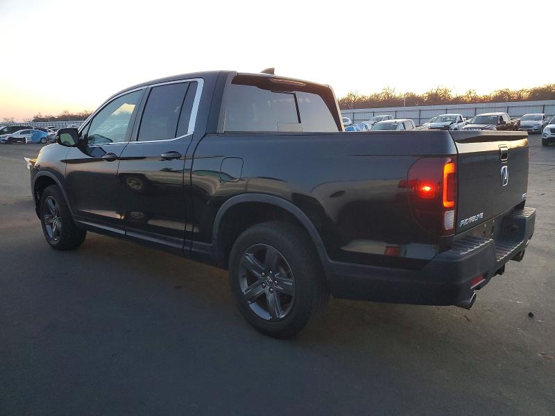 Photo 2 from auction – 2023 HONDA RIDGELINE with VIN 5FPYK3F54PB010213
