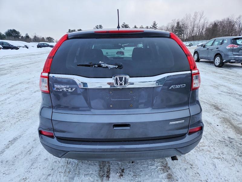 Photo 6 from auction – 2016 HONDA CR-V with VIN 5J6RM4H46GL093118
