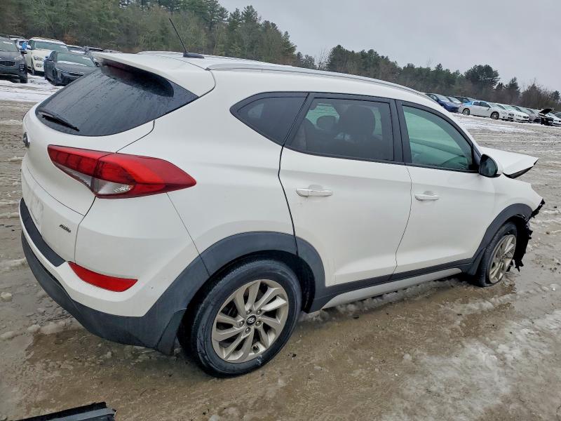 Photo 3 from auction – 2017 HYUNDAI TUCSON LIM with VIN KM8J3CA45HU565116