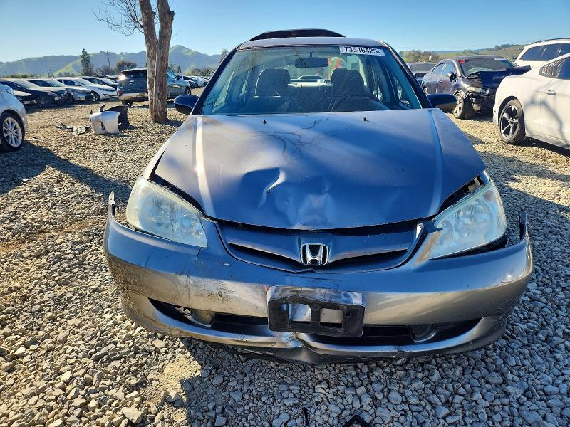 Photo 5 from auction – 2005 HONDA CIVIC DX with VIN 2HGES164X5H521201
