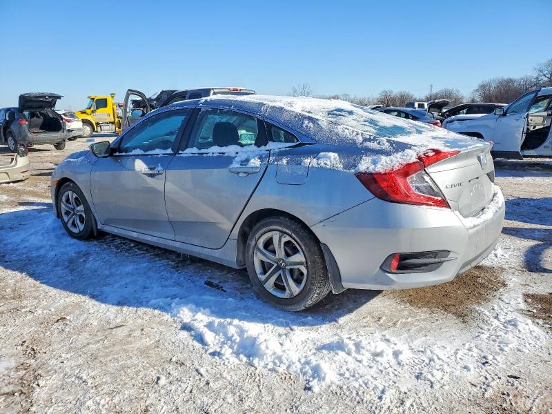 Photo 2 from auction – 2018 HONDA CIVIC with VIN 19XFC2F57JE033411