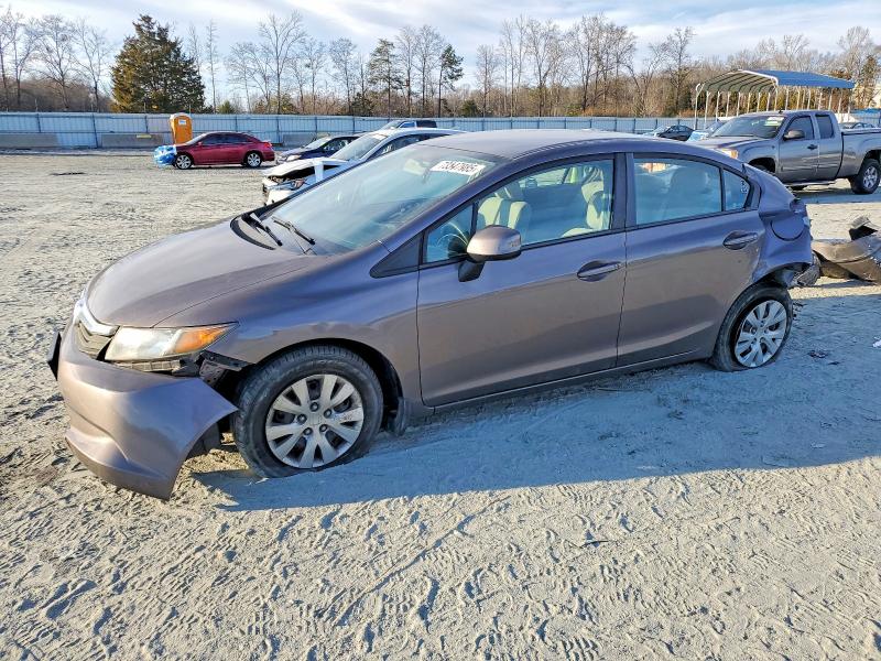HONDA CIVIC LX 2012 with VIN 2HGFB2F51CH597065 - Photo from auction