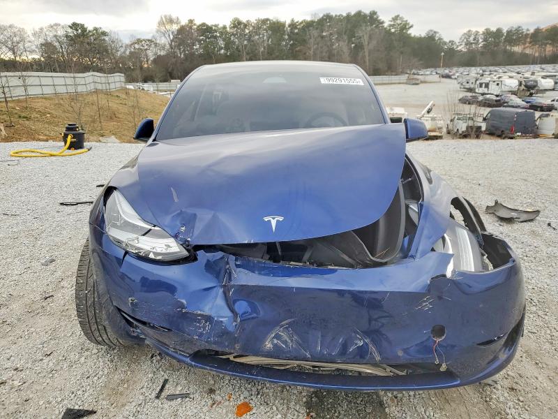 Photo 5 from auction – 2022 TESLA MODEL Y with VIN 7SAYGDEE3NF309953